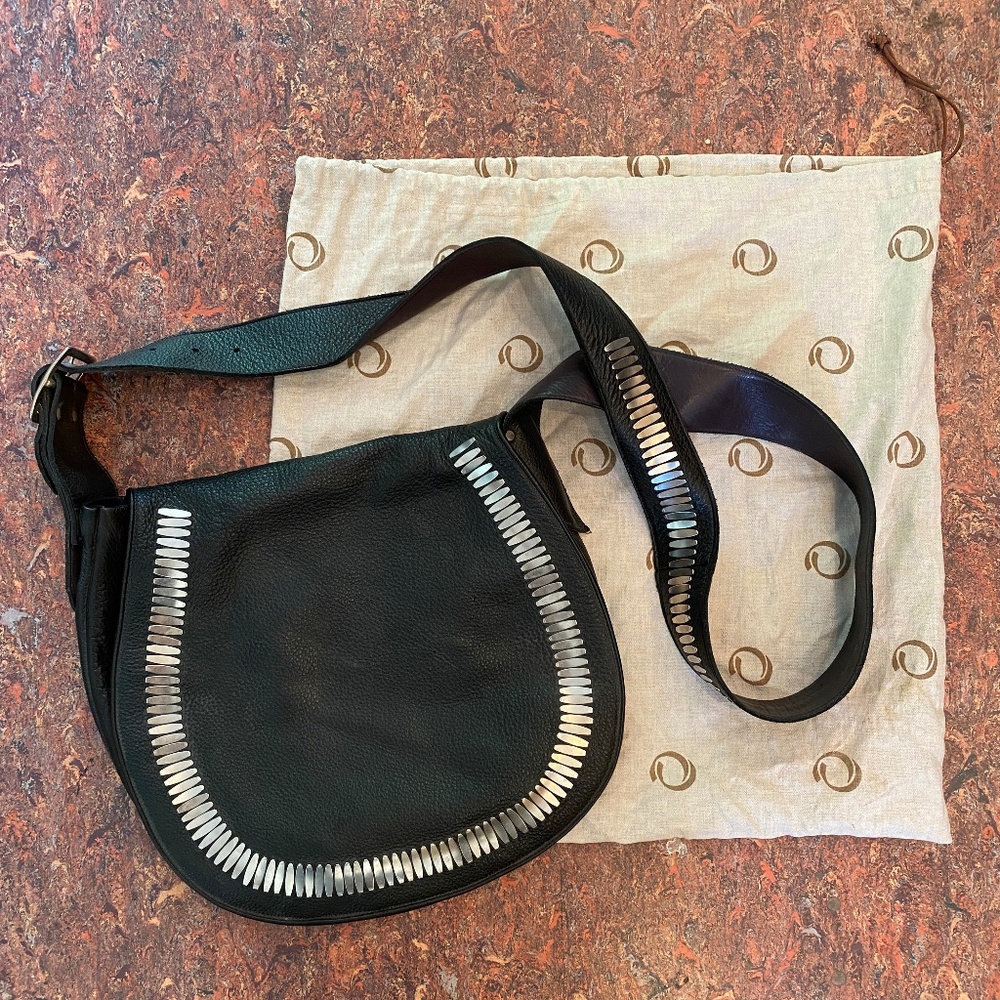 Calleen Cordero Black Leather Cleo Messenger Bag with Nickel Decoration.